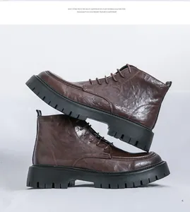 Close-up detail of vintage brown men's Martin boots featuring a thick black EVA sole