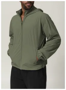 Side view showing details of men's olive green water-repellent hooded windbreaker