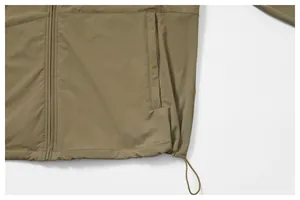 Detailed view of water-resistant outdoor jacket featuring adjustable drawstring and zipper