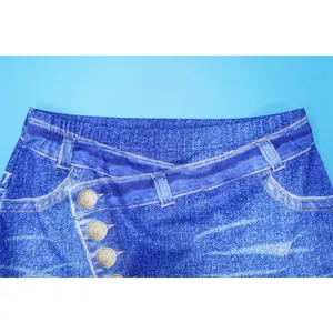 Close-up detail of a blue faux denim print skirt featuring a stylish crossover waist design.