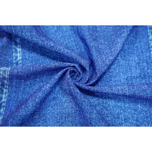 Macro close-up showing the detail of blue faux denim print on lightweight chiffon fabric