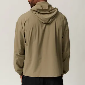 Rear view of men's water-repellent khaki hooded jacket for outdoor casual activewear