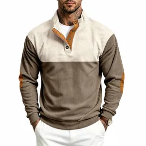 Detail of men's loose corduroy color-block sweatshirt with stand collar and elbow patches