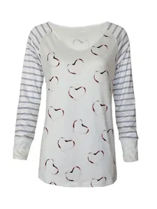 Close-up of women's long sleeve T-shirt with heart print and striped raglan sleeves