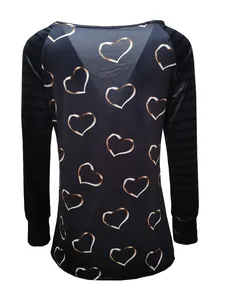Back view detail of black long sleeve T-shirt with heart print and striped sleeves