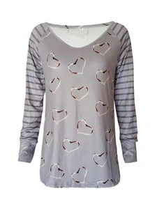 Detailed view of grey long-sleeve T-shirt with heart print and striped sleeves