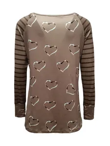 Detailed view of women's long sleeve T-shirt featuring heart print and striped sleeves