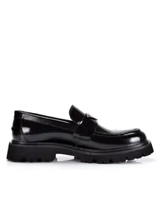 Premium men's shiny black patent leather loafers with thick lug soles and metal detail.