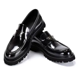 Premium glossy black patent leather chunky loafers for men with triangular metal logo plaque