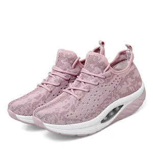 Detailed side view of pink fly-knit rocker shoes for women with thick soles