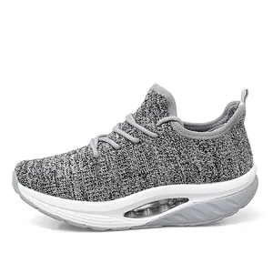 Detailed side view of women's grey fly-knit rocker shoes with thick platform cushion sole
