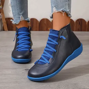 Stylish women's blue high-top Martin boots with comfortable flat soles and casual laces