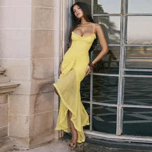 Full view of elegant yellow mesh camisole maxi dress with ruffle detailing