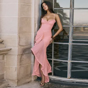 Elegant pink mesh camisole maxi dress featuring ruffles and a sexy backless design