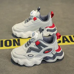 Sneakers per bambini bianche e grigie con dettagli rossi e sistema di chiusura a rotella
