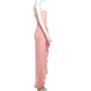 Side view of elegant pink mesh maxi dress with delicate ruffle trim and slim fit