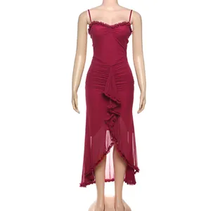 Detail view of burgundy mesh camisole dress featuring elegant ruffles and ruching.