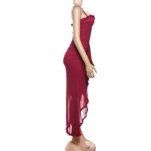 Side view of a sexy burgundy mesh backless maxi dress with delicate ruffle trim details