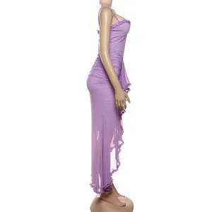 Side view of elegant purple mesh slip maxi dress with ruffled hem and slim fit.