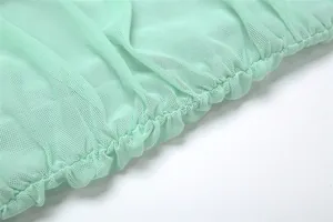 Detailed close-up showing the fine texture of mint green mesh fabric with ruched edges
