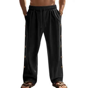 Détail du pantalon décontracté en lin noir pour homme avec cordon de serrage et boutons