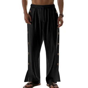 Détail du pantalon en lin noir pour homme avec cordon de serrage et boutons latéraux