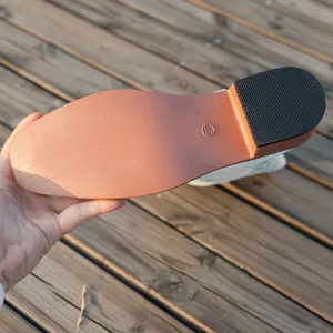 Close-up of the anti-slip textured sole and square heel on the bottom of the knight boot