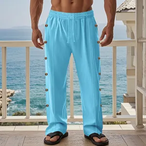 Détail du pantalon en lin bleu pour homme avec taille à cordon et boutons latéraux