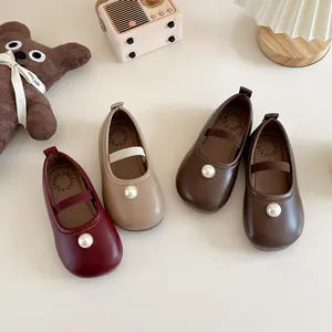 Classic Mary Jane shoes for girls featuring a single pearl accent and soft leather finish