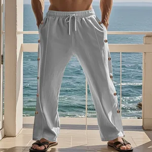 Vue détaillée d'un pantalon en lin gris pour hommes avec boutons latéraux et cordon