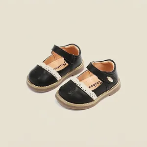 Elegant black Mary Jane shoes for toddler girls with lace trim and flower design