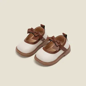 Elegant baby girls' Mary Jane princess shoes with soft soles and brown bow detail