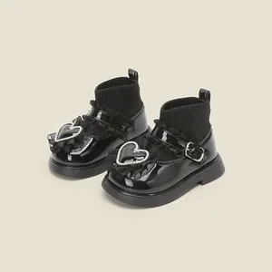 Elegant black patent leather baby princess shoes with sparkling heart crystal details