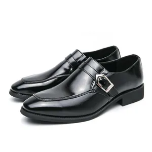 Classic black men's business casual monk strap leather shoes on a clean white background