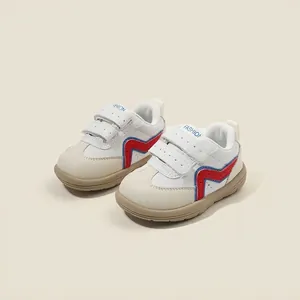 Zapatos para caminar para bebés con cierre de velcro y motivos de ondas rojas