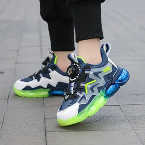 Scarpe sportive blu navy per bambini con chiusura a rotella e suola verde fluorescente