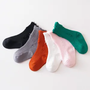 Fashionable distressed ribbed children's mid-tube socks set in various solid colors
