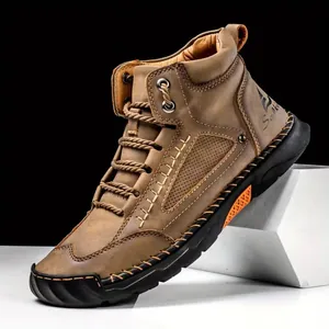 Fashionable men's PU leather ankle boots featuring hand-stitched details and a flat lace-up design