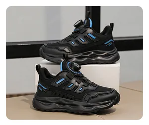 Side view of black kids sneakers with breathable mesh and quick dial lacing system