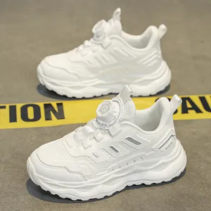 Lightweight breathable white children's running shoes with quick rotary dial lacing system