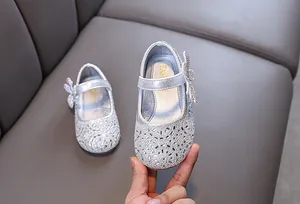 Elegant silver rhinestone princess shoes for girls with sparkling butterfly detail