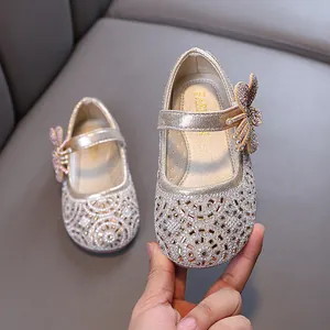 Elegant sparkling girl's princess Mary Jane shoes with butterfly bow and rhinestones