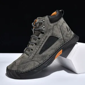 Men's vintage grey PU leather ankle boots featuring unique hand-stitched fashion design