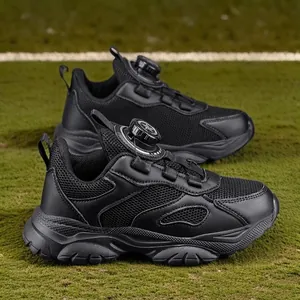 Boys black breathable mesh sports sneakers with a convenient quick-dial lacing system