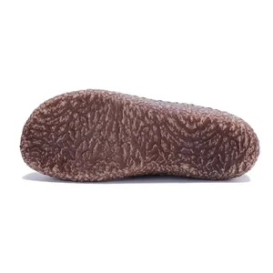 Textured rubber outsole of retro handmade leather shoe showing non-slip pattern