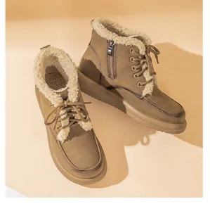 Detail view of khaki women's snow boots with cozy lamb wool lining and side zipper