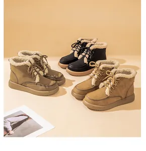 Detail view showing three colors of women's lace-up winter snow boots with plush wool trim