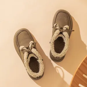 Warm lamb wool lined winter snow boots with lace-up design in olive green color.