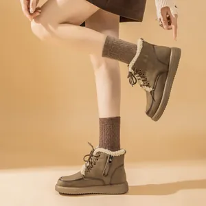 Fashionable brown women's lace-up snow boots with cozy lamb wool lining and side zipper