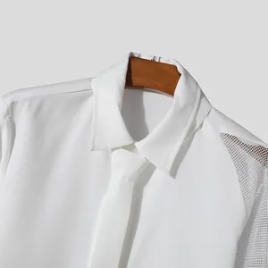Detail view of a white French men's banquet shirt featuring unique mesh shoulder splicing